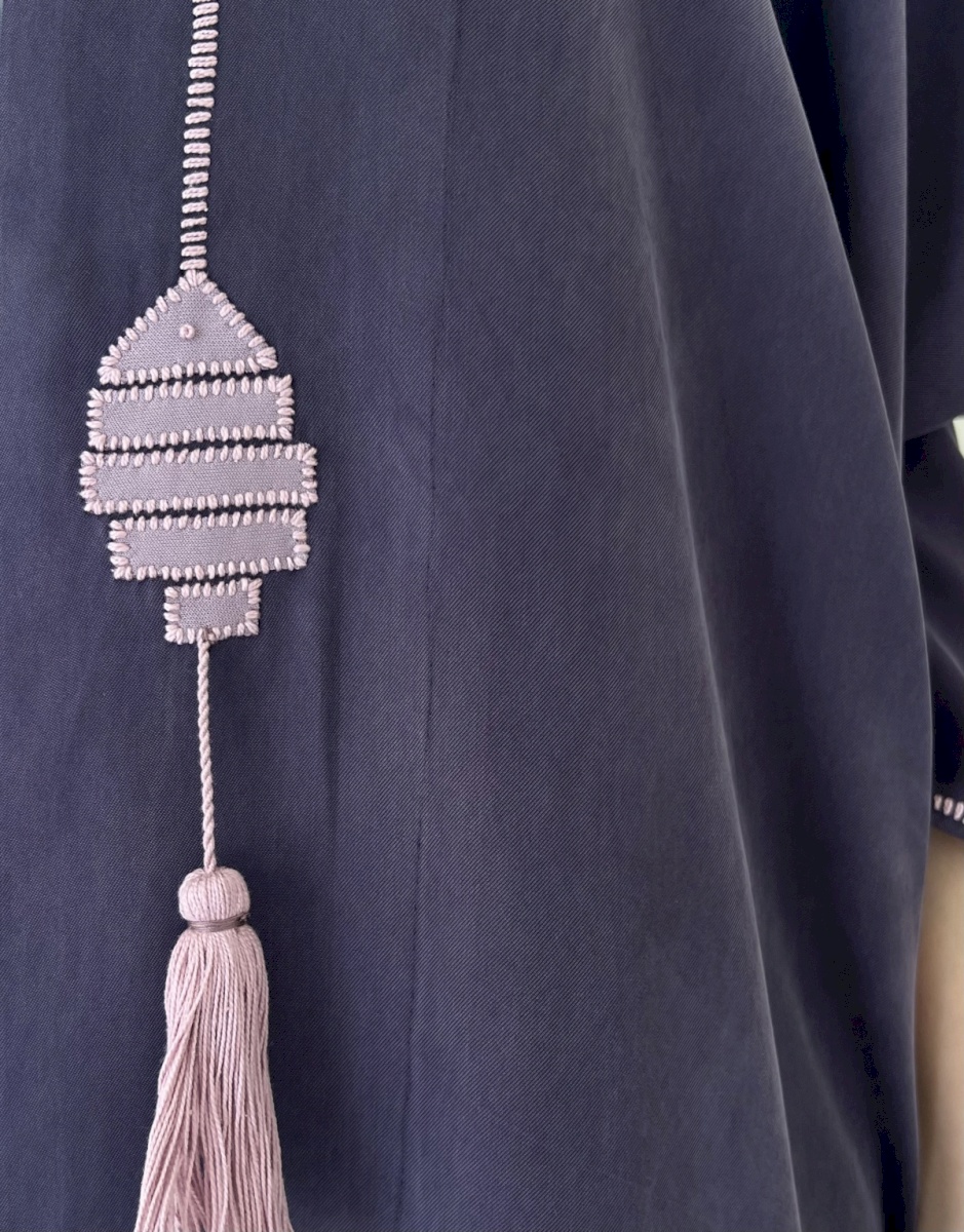 Purple fish tassel cloak