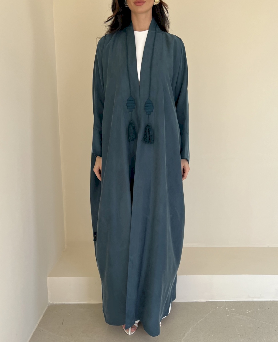 Teal fish tassel cloak