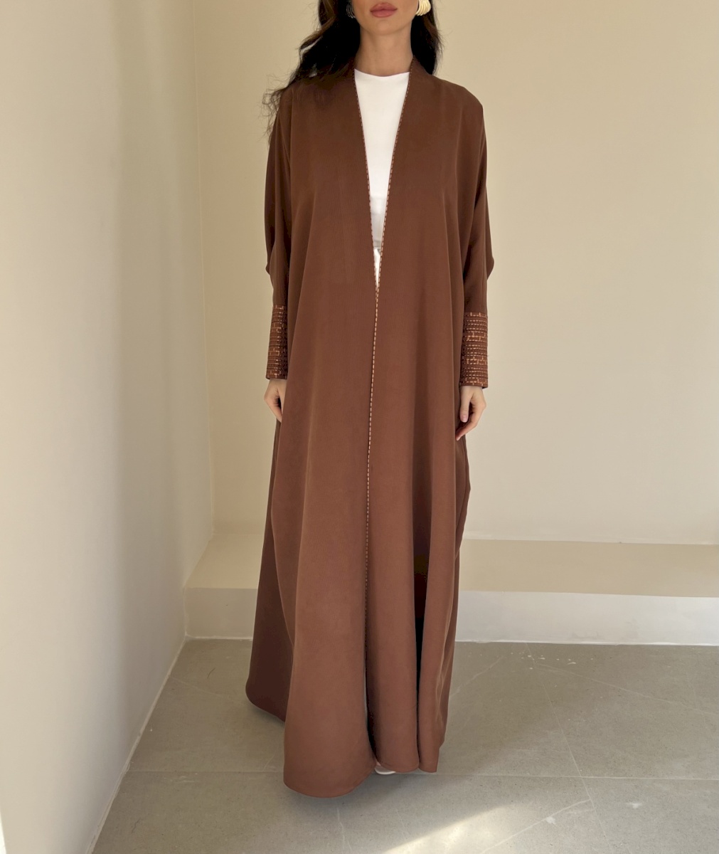 Burnt orange woven cuff cloak