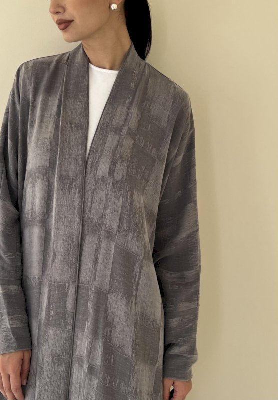 Grey textured grid cloak