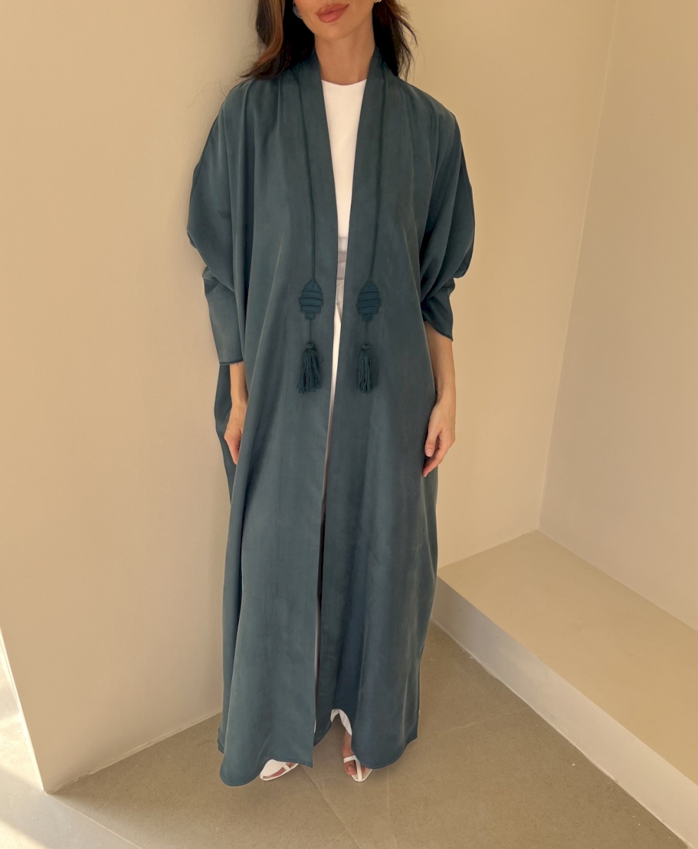 Teal fish tassel cloak